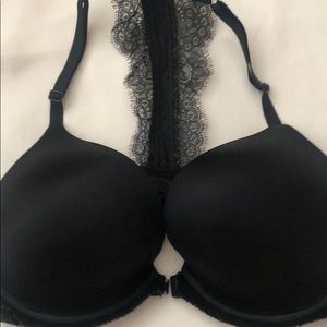 Front clasp padded push-up bra. Never worn